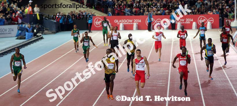 Usain Bold takes Jamaica into the lead and on to victory in the 4 x 100 metres at the Commonwealth Games, Glasgow. Photo: David T. Hewitson/Sports for All Pics